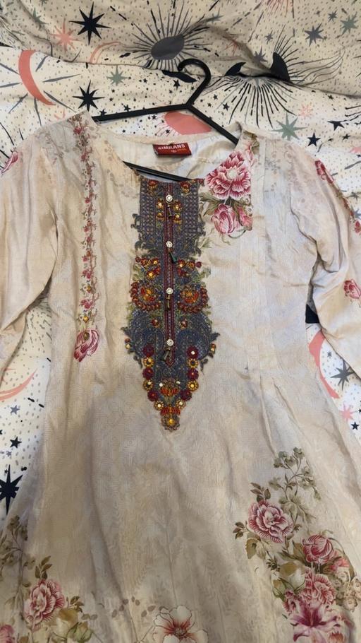  — Women’s Asian styled suit