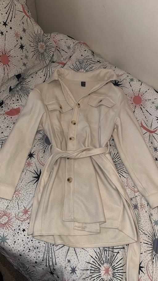  — Women’s cute tie back jacket