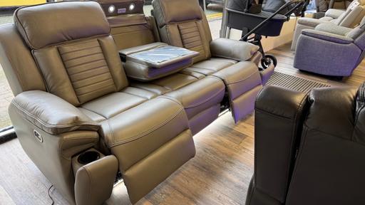 — Three seater grey leather cinema sofa
