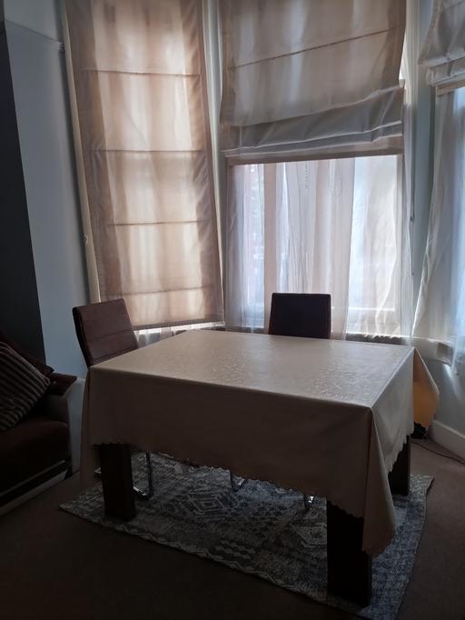  — Dining table (glass) - 2 brown chairs