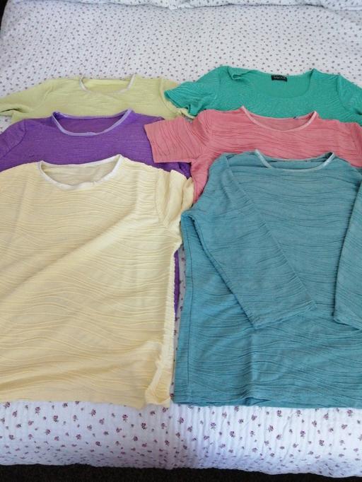  — Ladies size *M* the long sleeve one a *L*