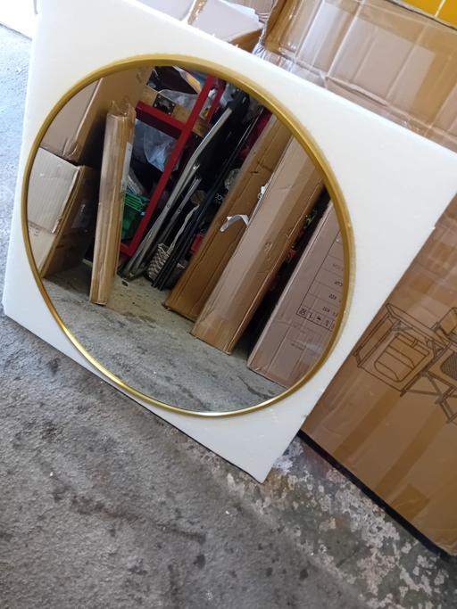  — New  gold framed mirror