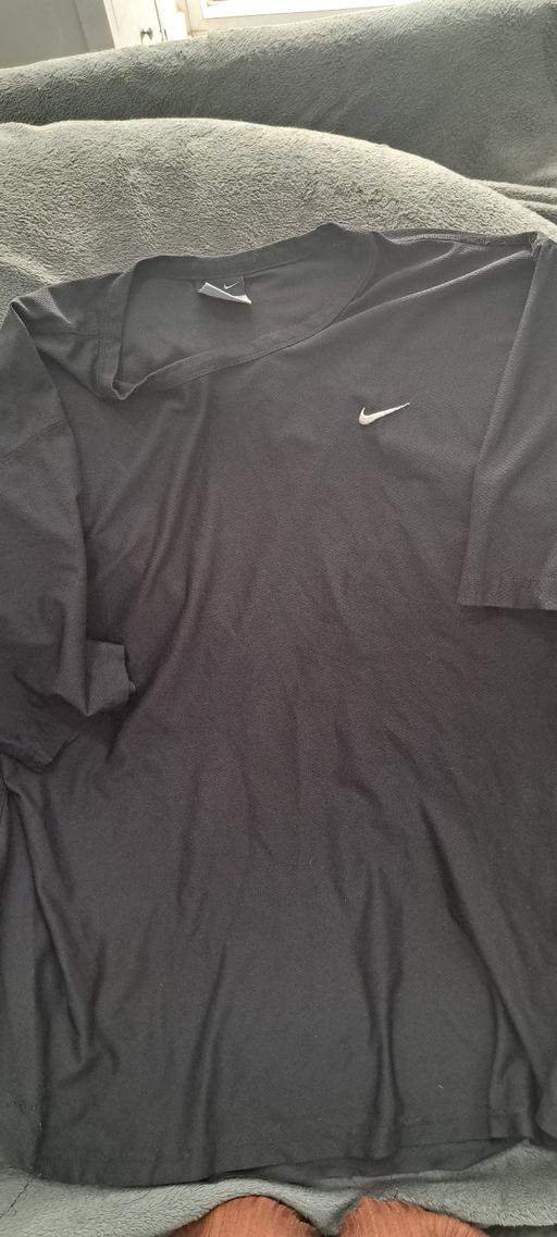  — Nike Top M