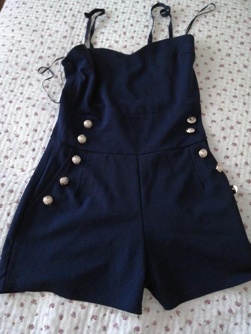  — ladies play suit size *10*  Quiz