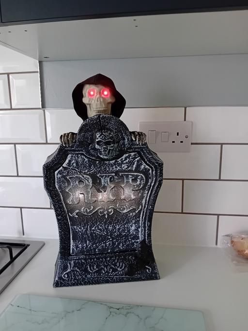  — animated tombstone