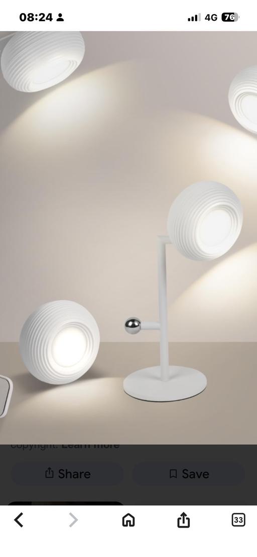  — Touch sensitive rechargeable table lamp