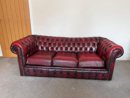  — Antique red leather chesterfield