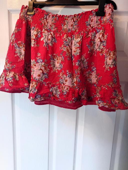  — Women's red floral skirt size 18