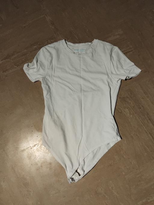  — Bodysuit 10-12.