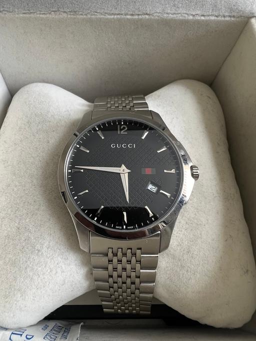  — Gucci timeless watch