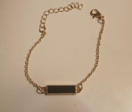  — Bracelet)