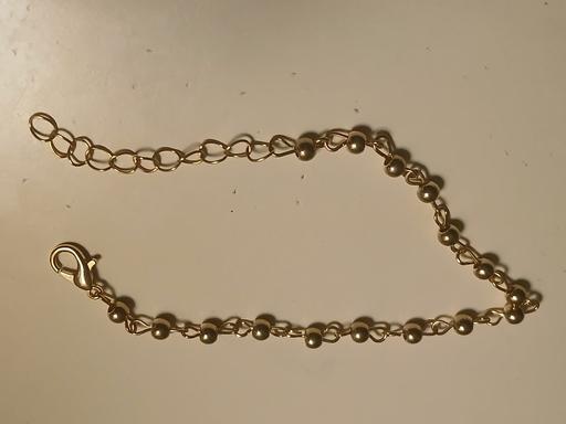  — Bracelet)
