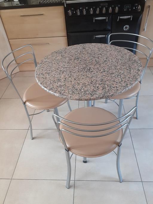  — Round Granite Top Table and 3 Chairs