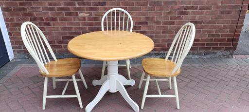  — Dropleaf Table and Three Chairs