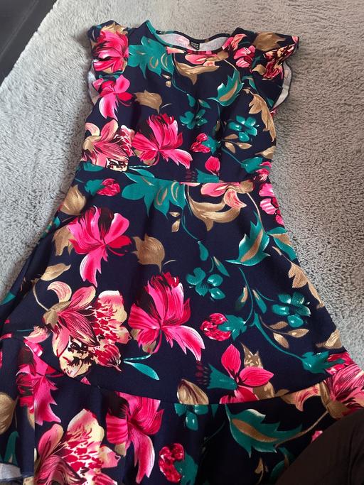  — Dress