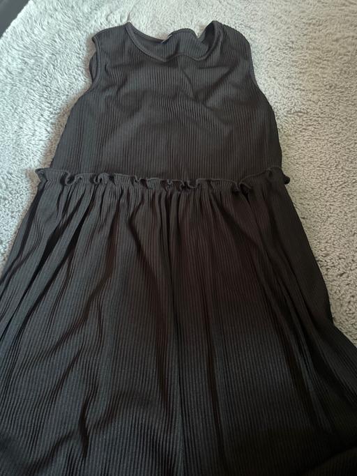  — Dress