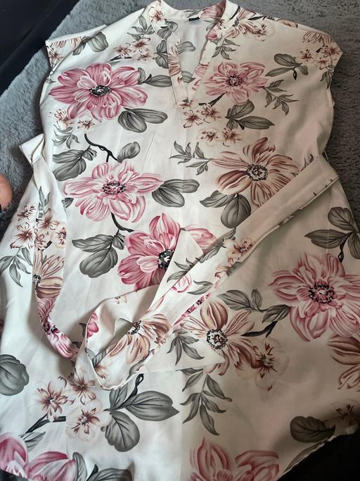  — Dress