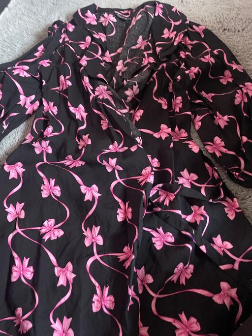  — Dress