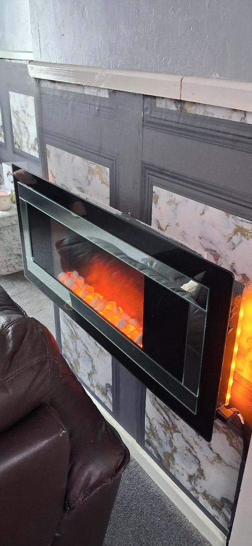  — WALL MOUNTED GLASS FRONT FIRE