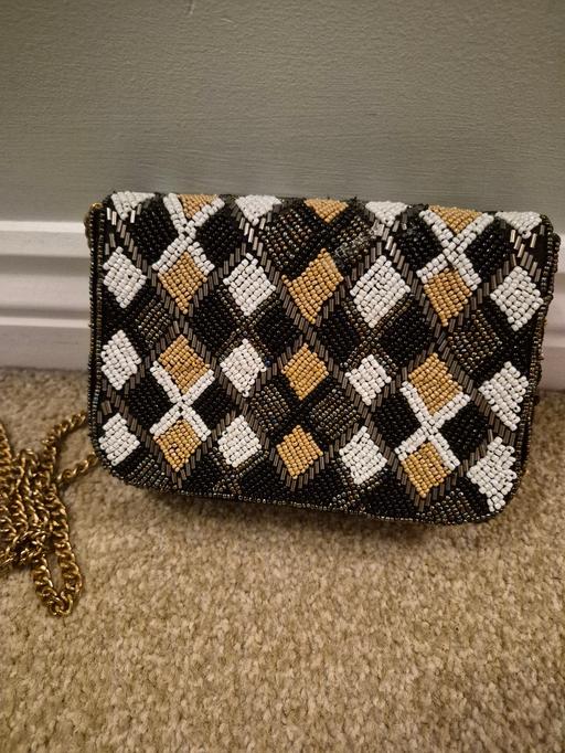 — M&S BEADED CLUTCH BAG