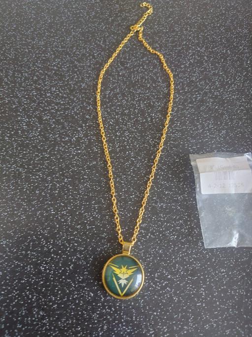 — Pokémon team instinct necklace