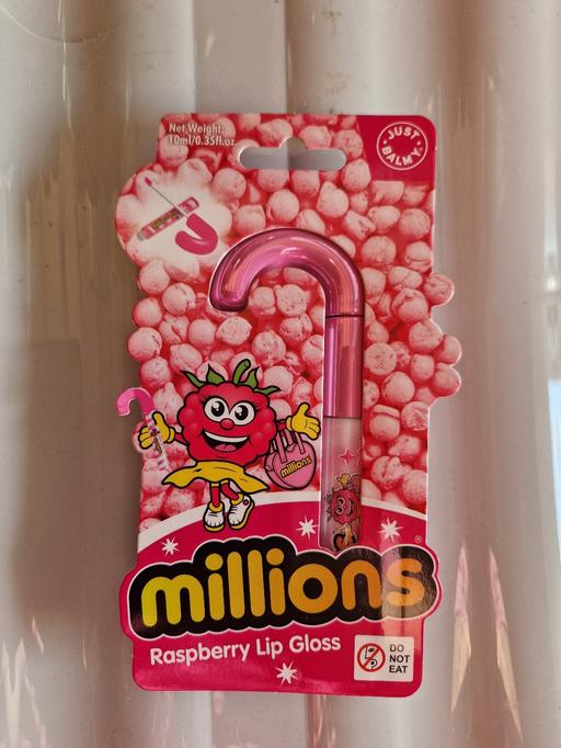 — bn Millions candy cane lipgloss