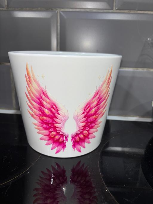  — Handmade plant pot with angel wings