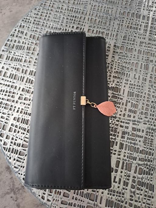  — new purse