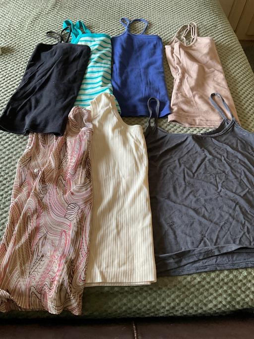  — vest tops
