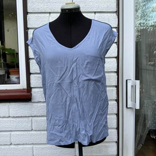  — Dust blue sleeveless top