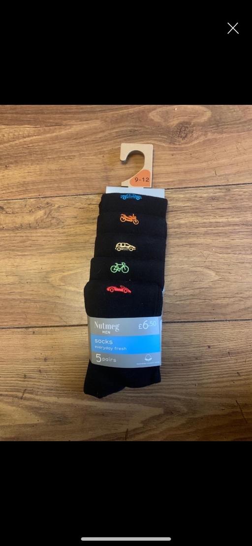  — Socks 9-12 men’s 5 pairs.