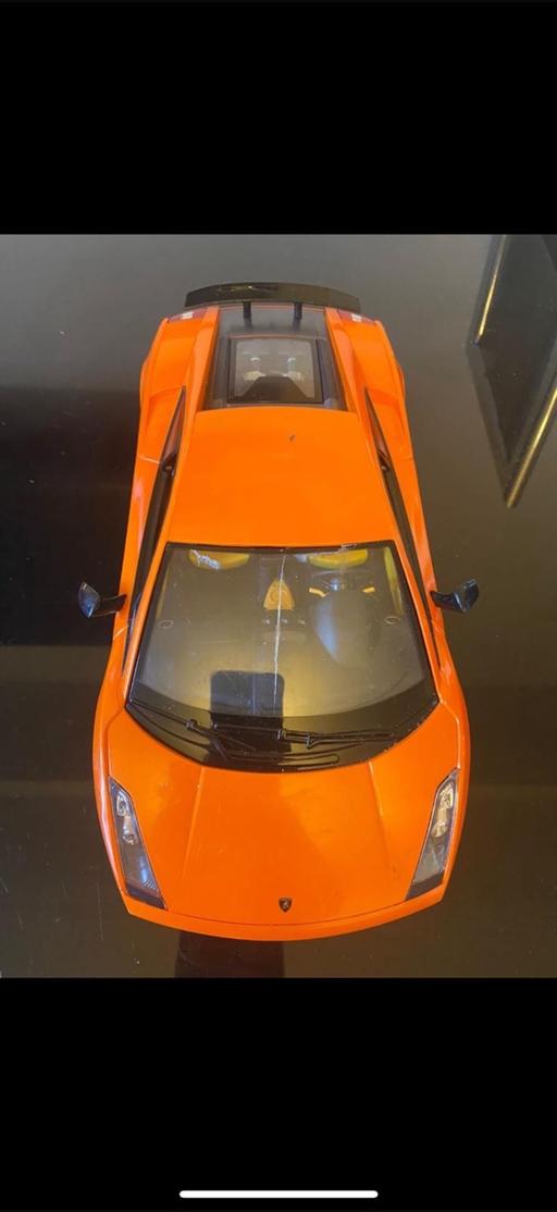  — Orange toy car