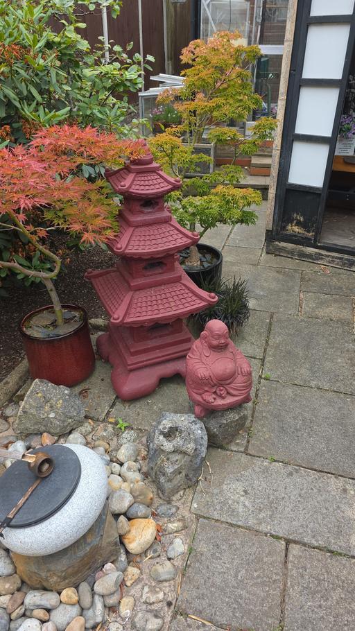  — garden statues