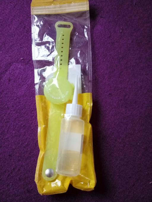  — brand new wristband sanitizer set