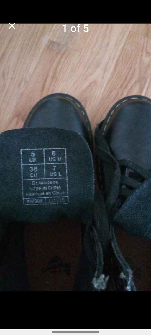  — Dr Martens