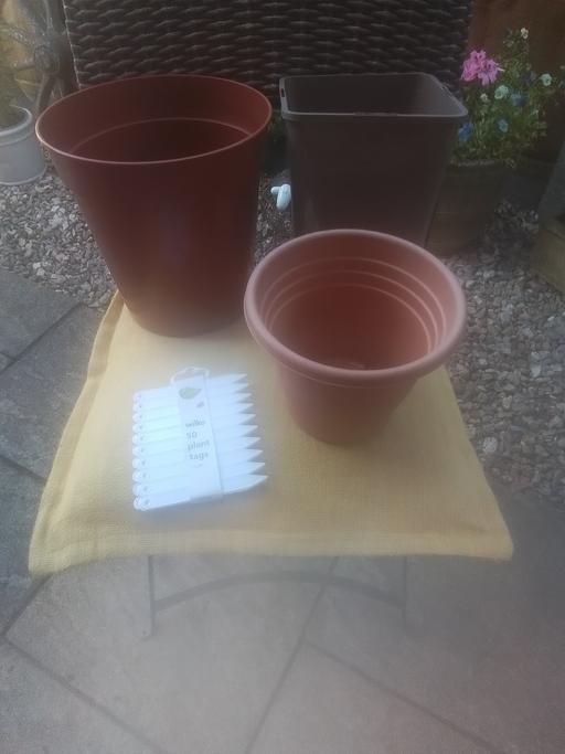  — THREE BRAND NEW PLANT POTS & & TAGS