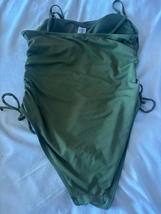  — Green swimsuit