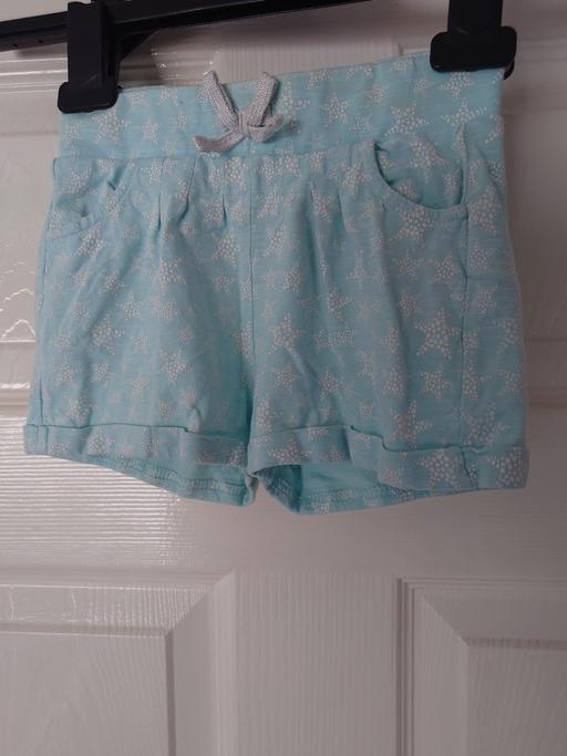  — Girls light blue shorts size 18-24 months