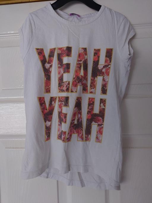  — Girls white top size 7-8 years