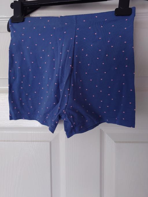  — Girls blue shorts size 11-12 years