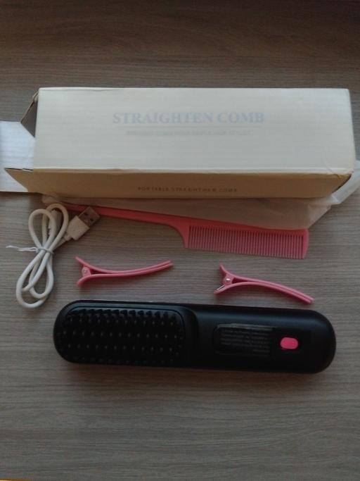  — New Straightening Brush.