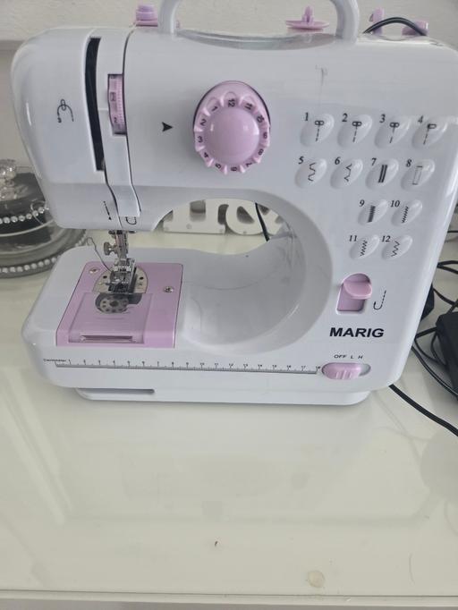  — mini sawing machine
