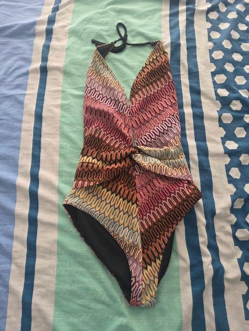  — swimsuits