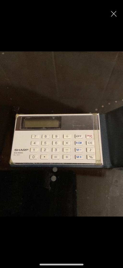  — Pocket Calculator
