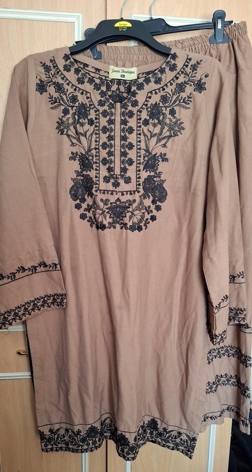  — Embroidered asian suit