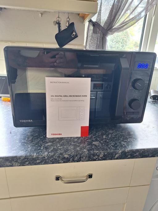  — Toshiba digital grill microwave