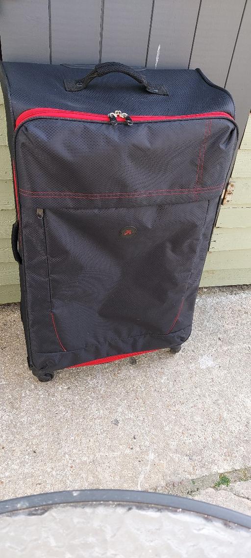  — 4 wheel spinning suitcase 35.00 each