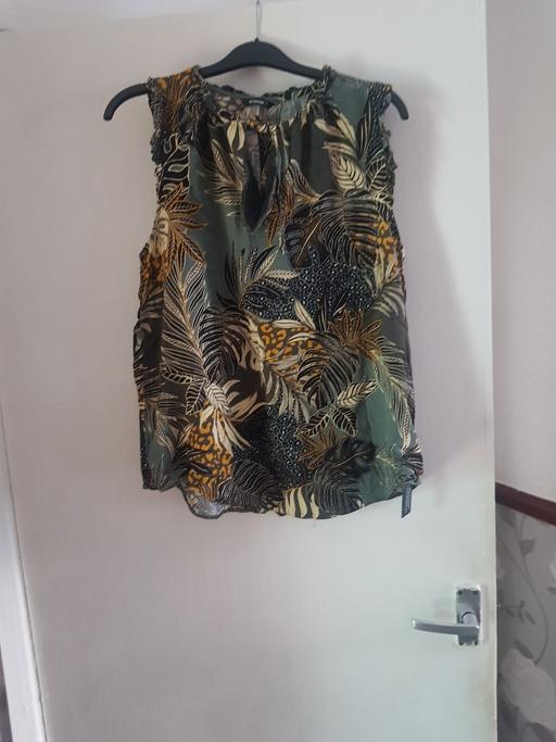  — ladies top size 12