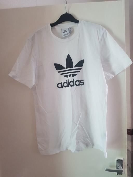  — Adidas medium top