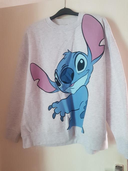  — ladies stich jumper size large